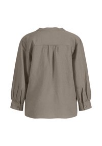 Beige košile s dlouhým rukávem vyrobená z měkké tkaniny, s detailem přehybů na zádech, plisováním, knoflíkovými manžetami a volným střihem.