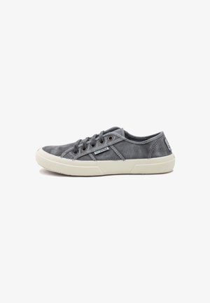 Gray fabric sneakers with white rubber sole, lace-up front, metal eyelets, and textured side accents. Minimalist design with logo detail.