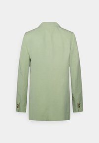 Blazer su misura verde chiaro con maniche lunghe, colletto a rever e polsini con bottoni. Realizzato in materiale liscio con un design pulito e minimal.