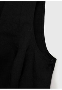 Black sleeveless garment with a smooth texture, featuring a side zipper. The fabric has a slightly structured design and clean stitch detailing.
