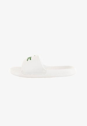 White slide sandal made of synthetic material. Features a smooth upper with a green logo and a textured, cushioned footbed.