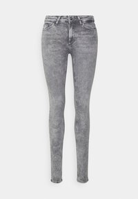 Šedé džíny slim-fit s vybledlým vzhledem, pět kapsami, poutky na opasek, předním knoflíkem a zipem. Bez viditelného loga.