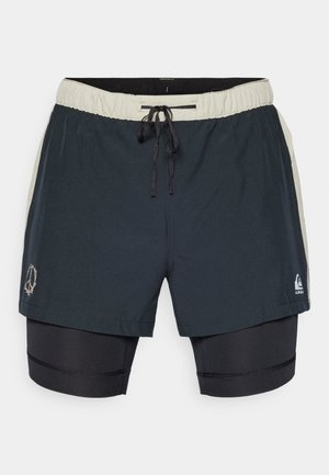 Czarne kąpielówki z elastycznym pasem ze sznurkiem, warstwowym designem i bocznymi akcentami w kontrastującym jasnym kolorze.