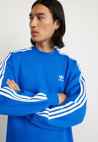 adidas Originals OVERSIZE CREW - Sportinis megztinis - blue