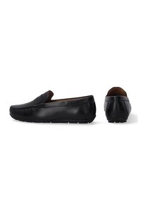 Sorte læderloafer med glat tekstur, rund tå og minimal syning. Har en fleksibel sort gummisål.