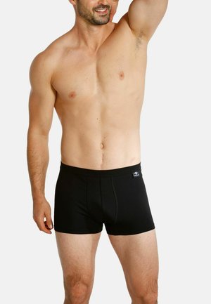 Black boxer shorts made from a stretchy fabric, featuring a fitted design and a smooth waistband. No patterns or accents visible.