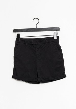 Black cotton shorts with a standard waistband, front pockets, and rolled hems. Features a smooth texture and minimal design.