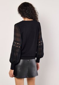 Apricot Strickpullover - black