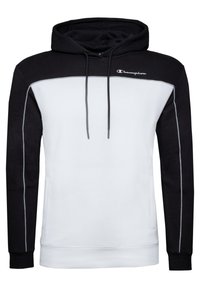 Sudadera con capucha diseñada con una parte superior negra y una parte inferior blanca, que cuenta con cordones, un bolsillo frontal y costuras en contraste.