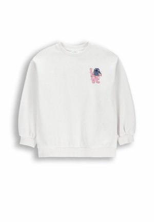 Biała bluza z długim rękawem i okrągłym dekoltem z różowym napisem "LOVE" oraz małą niebieską postacią z kreskówki wystającą z litery "O" na piersi.