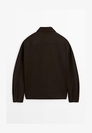 Dark brown long-sleeve jacket with a collar, buttoned cuffs, and a straight hem, shown from the back on a white background.
