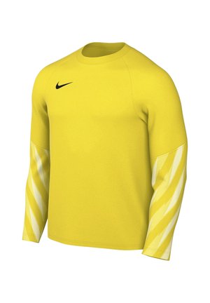 Maillot de sport jaune à manches longues avec col rond, logo Nike noir sur la poitrine et bandes diagonales jaune plus clair sur les manches.