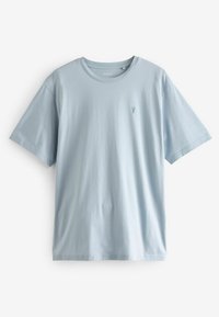 Lyseblå bomulds-t-shirt med korte ærmer, rund halsudskæring og et lille broderet logo på venstre bryst. Glat struktur og afslappet pasform.