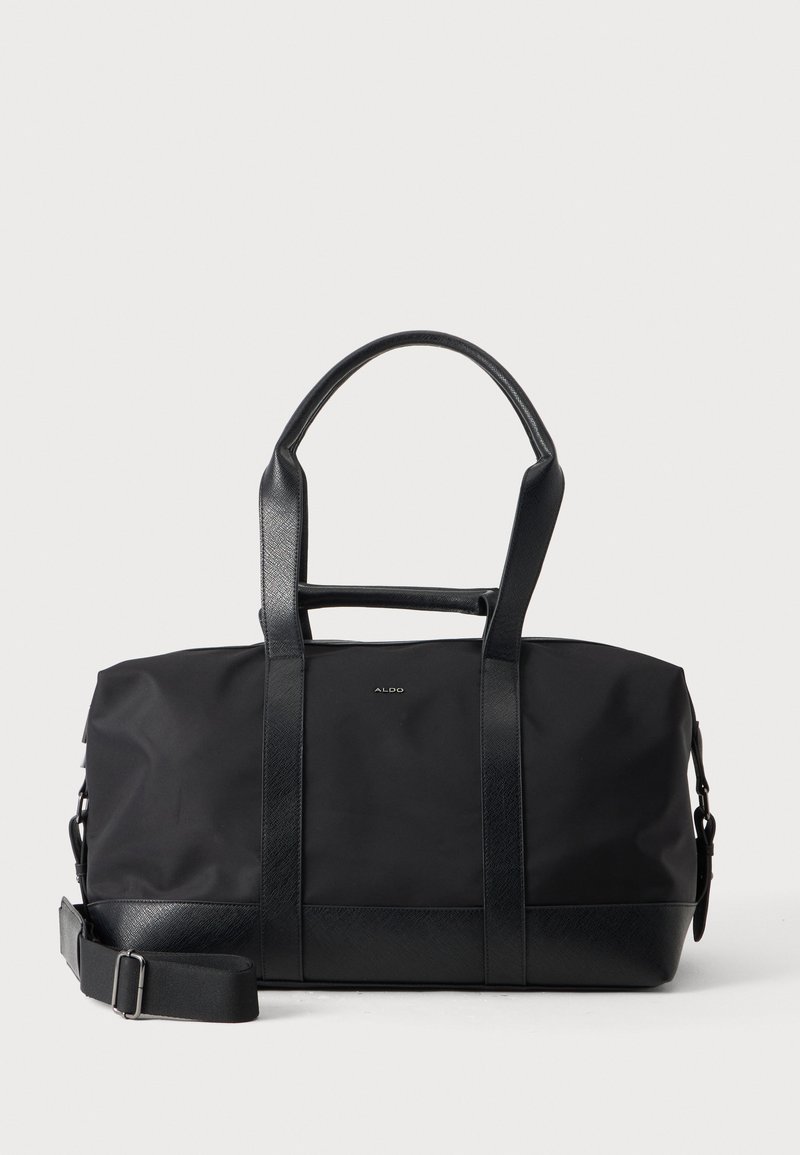 Sac polochon ALDO noir avec poignées en cuir et bandoulière réglable sur un fond clair uni.