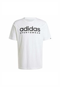 Camiseta blanca de algodón con un audaz logo negro de "adidas" y el texto "SPORTSWEAR". Cuello redondo, mangas cortas, diseño minimalista.