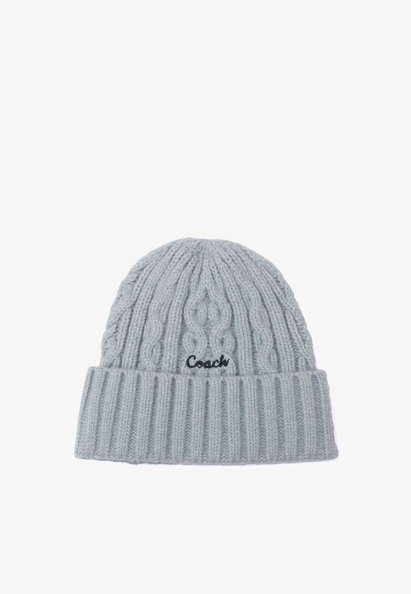 Gray knit beanie with cable pattern and ribbed cuff. Features embroidered "Coach" logo in dark thread on the front.