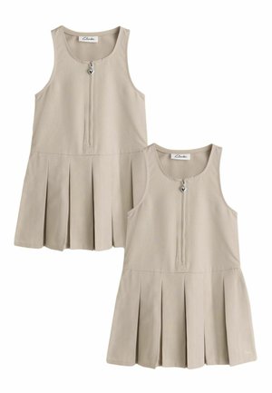 Vestidos beige sin mangas con faldas plisadas y cremalleras delanteras con tiradores en forma de corazón, expuestos uno al lado del otro.