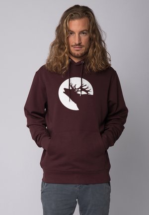 Bordeaux hoodie met een voorzak en trekkoorden, met een witte graphic van de silhouet van een eland tegen een cirkelvormige achtergrond. Gemaakt van een katoenmix.
