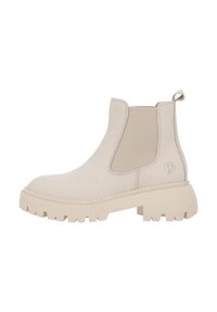 Botas Chelsea de ante beige con paneles laterales elásticos, suelas de goma gruesas, punta redonda y tacón pequeño, con un acento de logo en el costado.