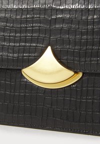 sessùn DIVILUZ - Bandolera - black