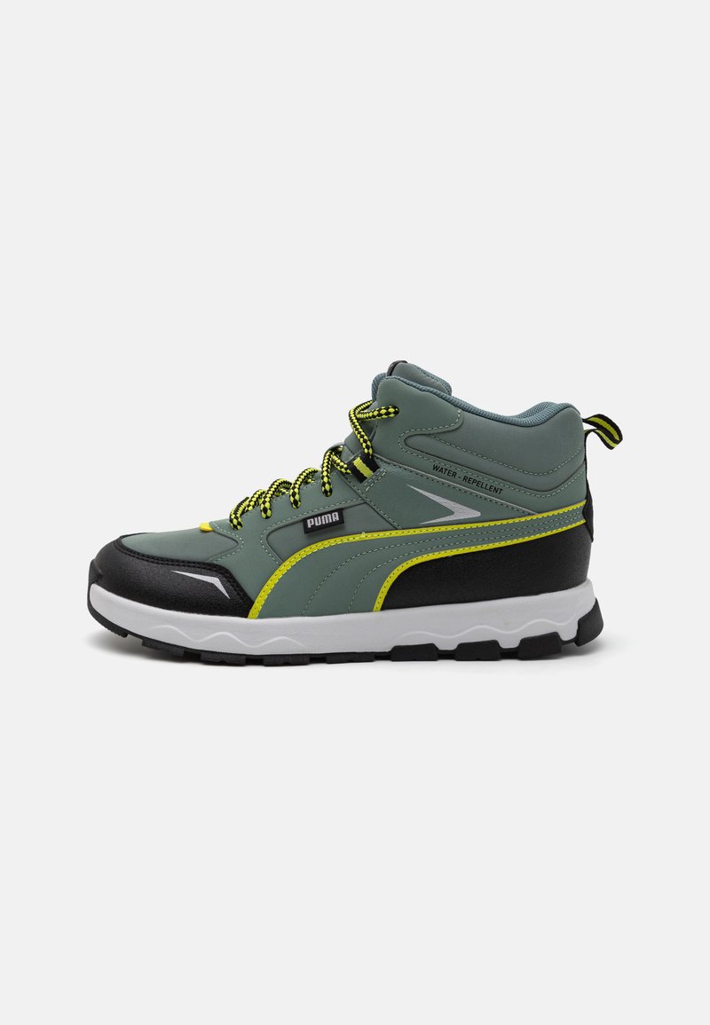 High-top athletic shoes featuring a dark green and black design, water-repellent material, yellow accents, and textured rubber sole.