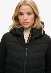 Superdry & Co HOODED STORM HYBRID PADDED - Vinterjakker - black