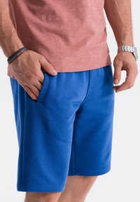 Ombre Pantaloni sportivi - blue