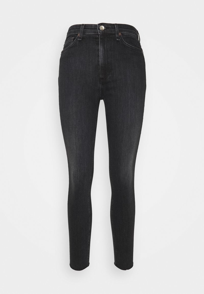 Jean noir slim taille haute avec fermeture à boutons et fermeture éclair à l'avant, poches avant et arrière, présenté sur un fond uni.