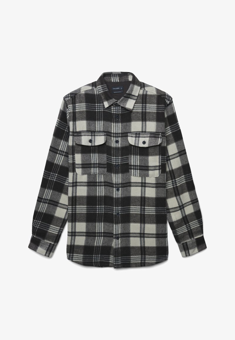 Camicia in flanella a quadri bianca e nera con maniche lunghe, due tasche sul petto, chiusura con bottoni e colletto. Tessuto morbido, design casual.