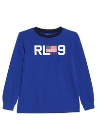 Dlouhý rukáv tričko v jasně modré bavlně, s bílým a červeným potiskem s "RL 9" a akcentem americké vlajky na hrudi.