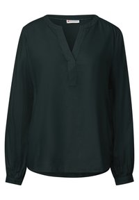 Mörkgrön blus med lång ärm, V-ringning och rynkade manschetter, tillverkad av mjukt tyg. Den har en avslappnad passform och en något rundad nederkant.