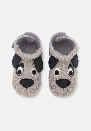 Gray, fluffy slippers shaped like a dog's face with black felt ears and large, embroidered eyes. Soft, textured material and rounded design.