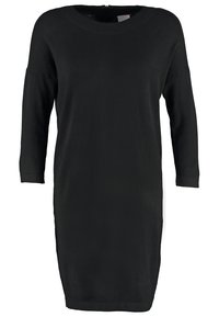 Robe noire en maille longueur genou avec manches longues et encolure ronde, silhouette simple et ajustée.