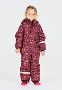Bordeaux-gepatroneerde sneeuwoverall met een capuchon, elastische cuffs en reflecterende accenten. Het ontwerp bevat een bloemmotief en is gevoerd voor extra warmte.