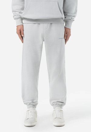 Pegador LOGO JOGGER - Tracksuit bottoms - washed clear grey gum