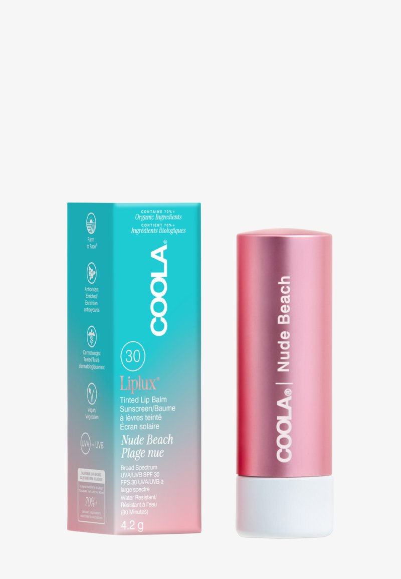 COOLA Liplux tinted lip balm with SPF 30 in Nude Beach shade, with turquoise and pink gradient box and pink tube packaging.