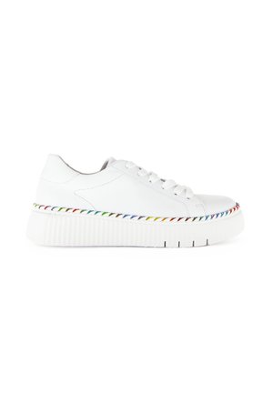White sneakers with a textured rubber sole, featuring a layered design and a multicolored stitched accent around the midsole.