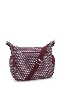Borsa a tracolla con motivo geometrico in bordeaux, grigio e bianco, tasca frontale con zip, tasche laterali e tracolla regolabile bordeaux.