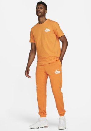 Tracksuit bottoms - orange