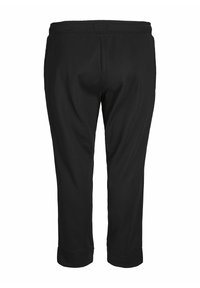 Pantalons noirs raccourcis en tissu doux, avec une texture lisse, une taille élastique et des poignets, sans motifs ni accents visibles.