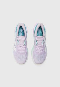 Purple athletic shoes with white stripes, textured upper, and aqua accents. Features lace-up design and cushioned soles for comfort.