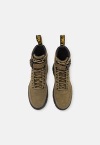 Dr. Martens Botines con plataforma - olive