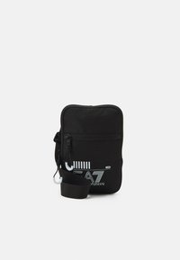 TRAIN CORE MINI POUCH BAG UNISEX - Taška s příčným popruhem - black/white