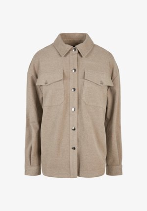 Jachetă bej din lână cu nasturi, mâneci lungi, două buzunare frontale cu clapetă și nasturi tip capse și guler clasic.