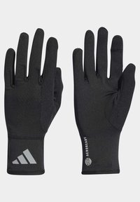 Černé sportovní rukavice vyrobené z hladkého materiálu, s texturovanou dlaní a elastickým zápěstím. Na manžetě je vidět šedé logo a nápis "AEROREADY".