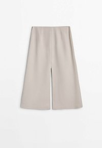 Beige wide-leg trousers with a smooth texture, featuring a high waist and two front pleats. Cropped length with a clean, minimal design.
