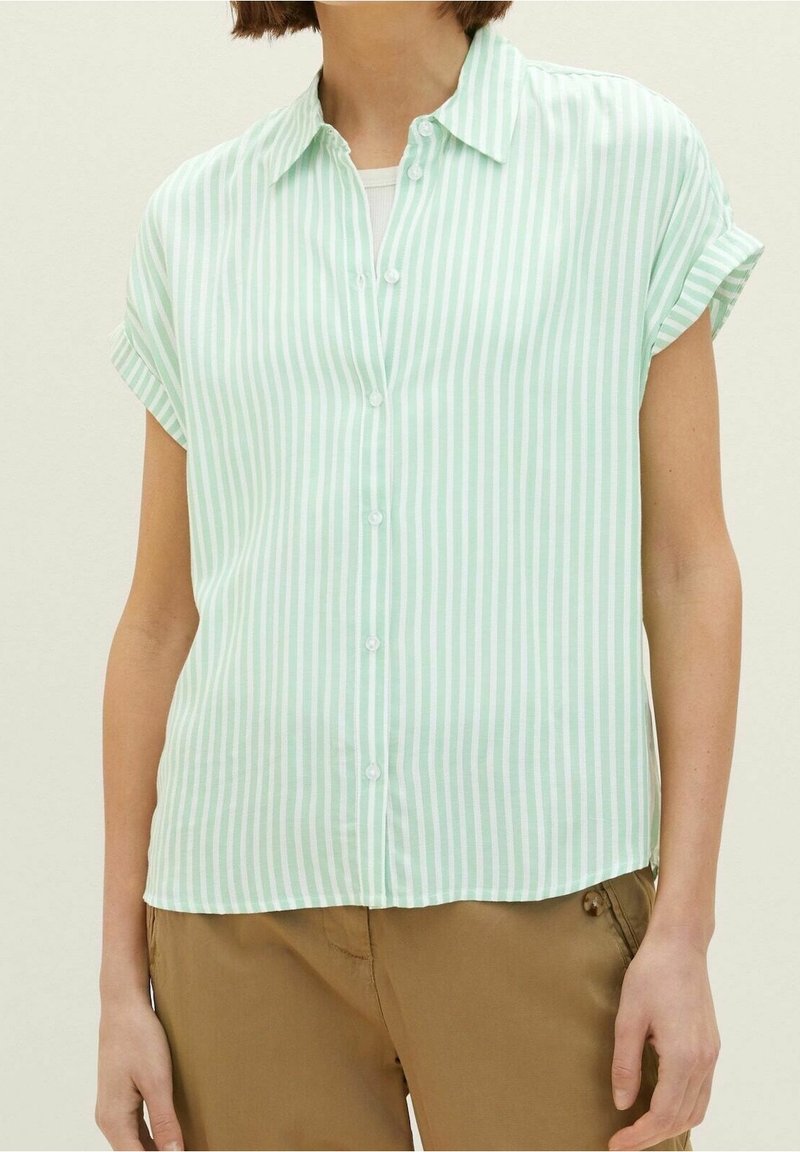 Striped short-sleeve shirt in light green and white. Features a collared neckline, button front, and soft texture.