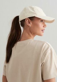 aim’n® Cappellino - beige