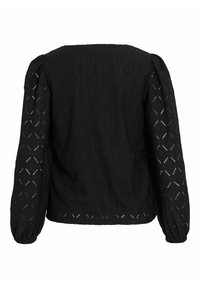 Blusa nera con tessuto texture con motivi a diamante, maniche a sbuffo e polsini elastici. La vista posteriore mostra un design pulito e semplice.