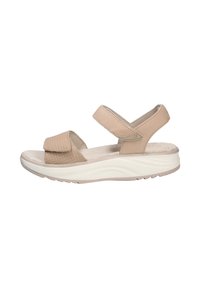 Sandalias beige con correas ajustables, zona de los dedos texturizada, plantilla suave y suela blanca gruesa con líneas onduladas.
